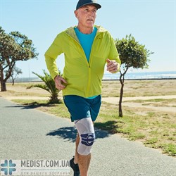 Умный коленный бандаж GenuTrain A3 Bauerfeind - динамический наколенник для комплексного лечения болей в коленном суставе с коррегирующим пелотом и специальной массирующей вставкой - для женщин и мужчин